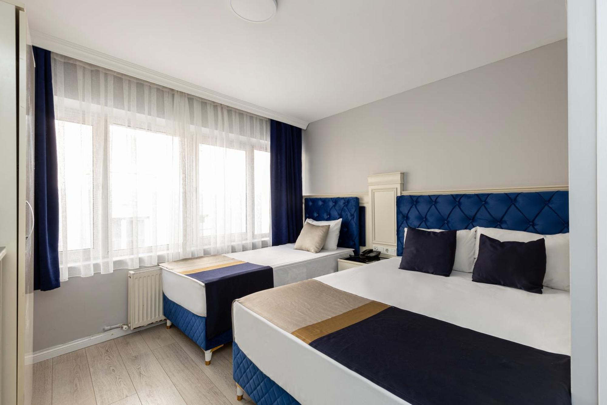 Deluxe Triple Room