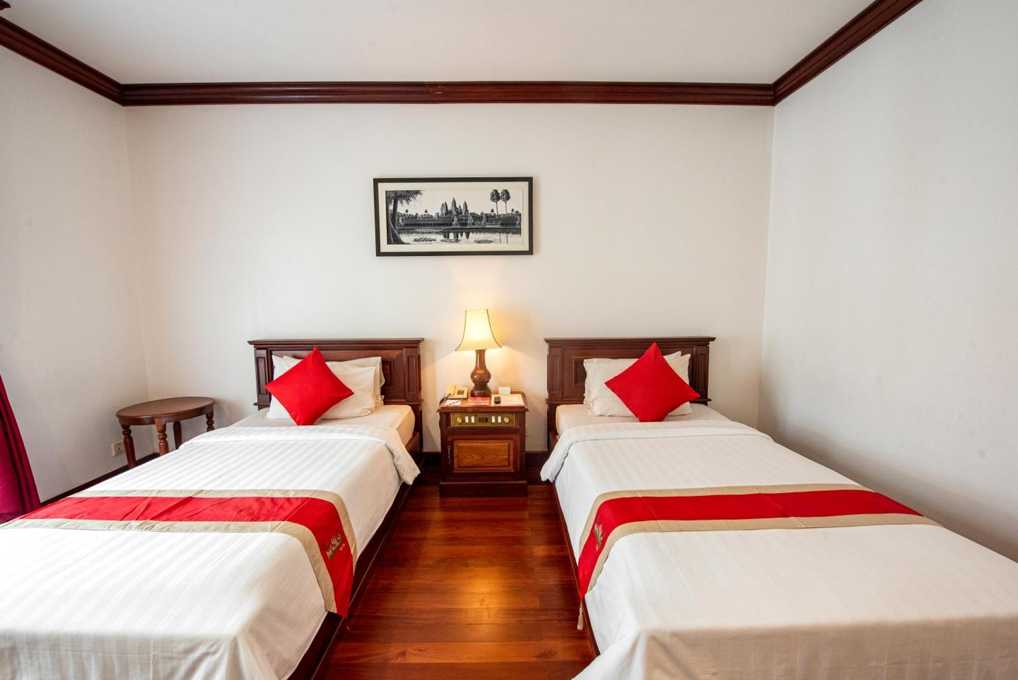 Quarto Deluxe com 2 Camas de Solteiro e Varanda