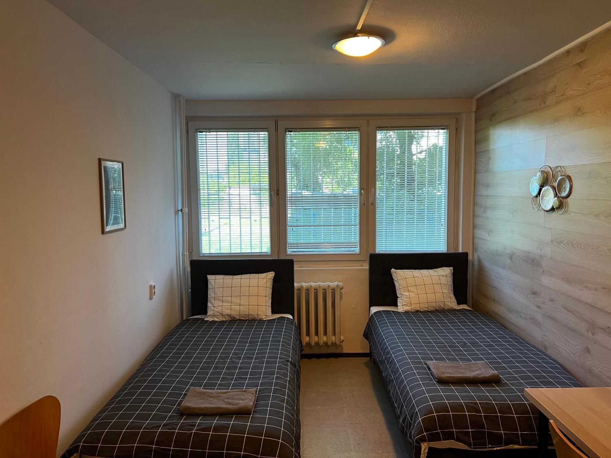 Zweibettzimmer mit Gemeinschaftsbad