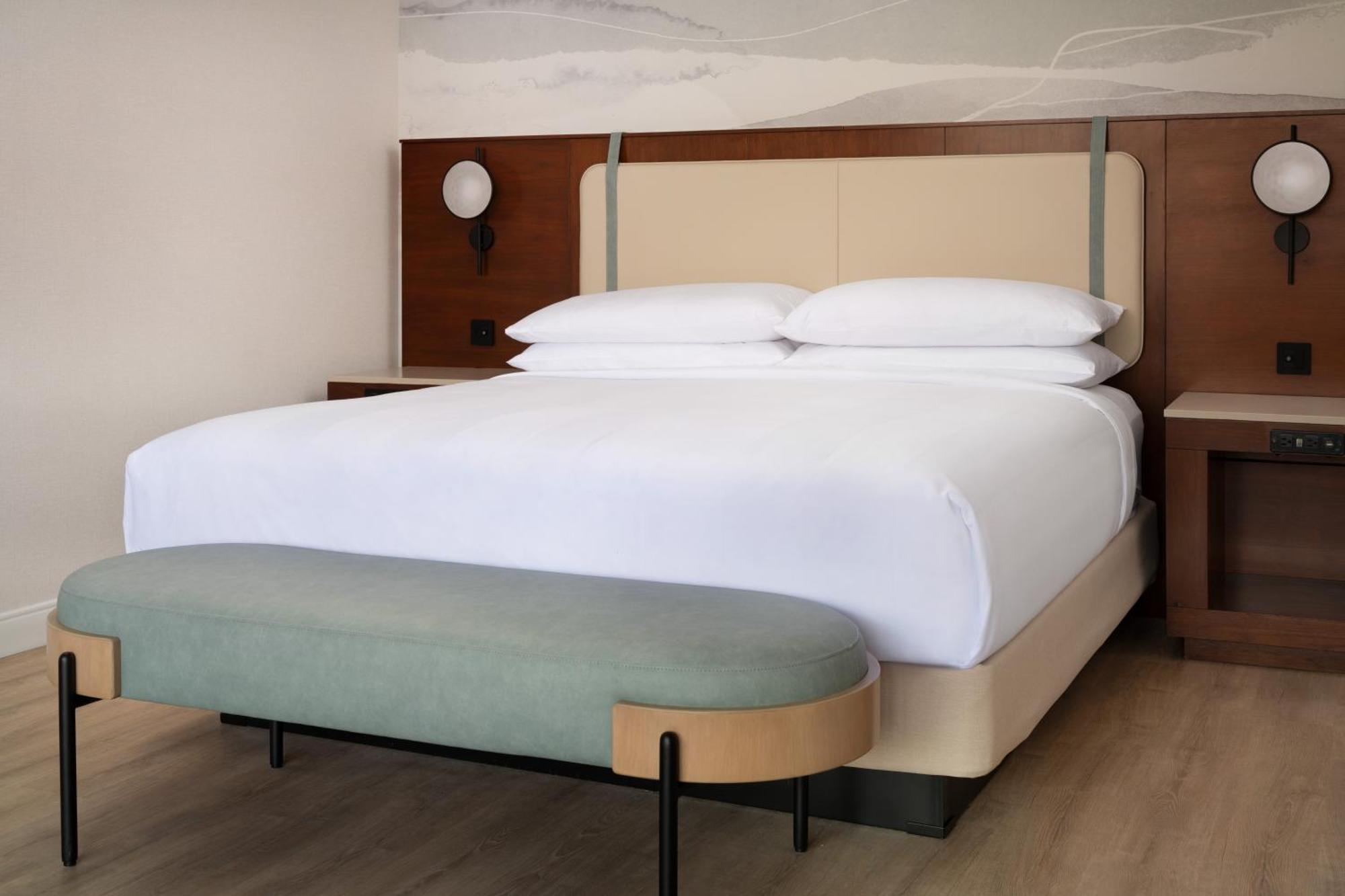 Junior King Suite with Sofa Bed and Harbour View - Mobility Accessible with Roll-in Shower