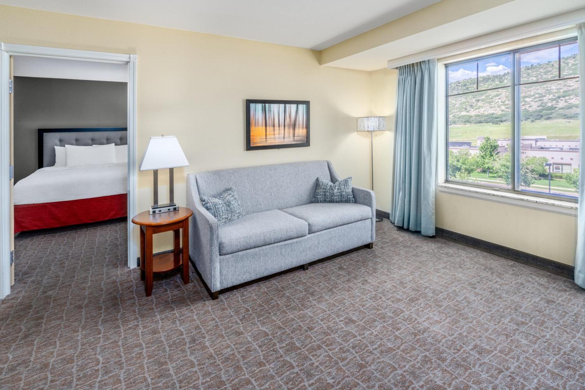 Two Bedroom Suite with One King and Two Queen Beds - Non-Smoking