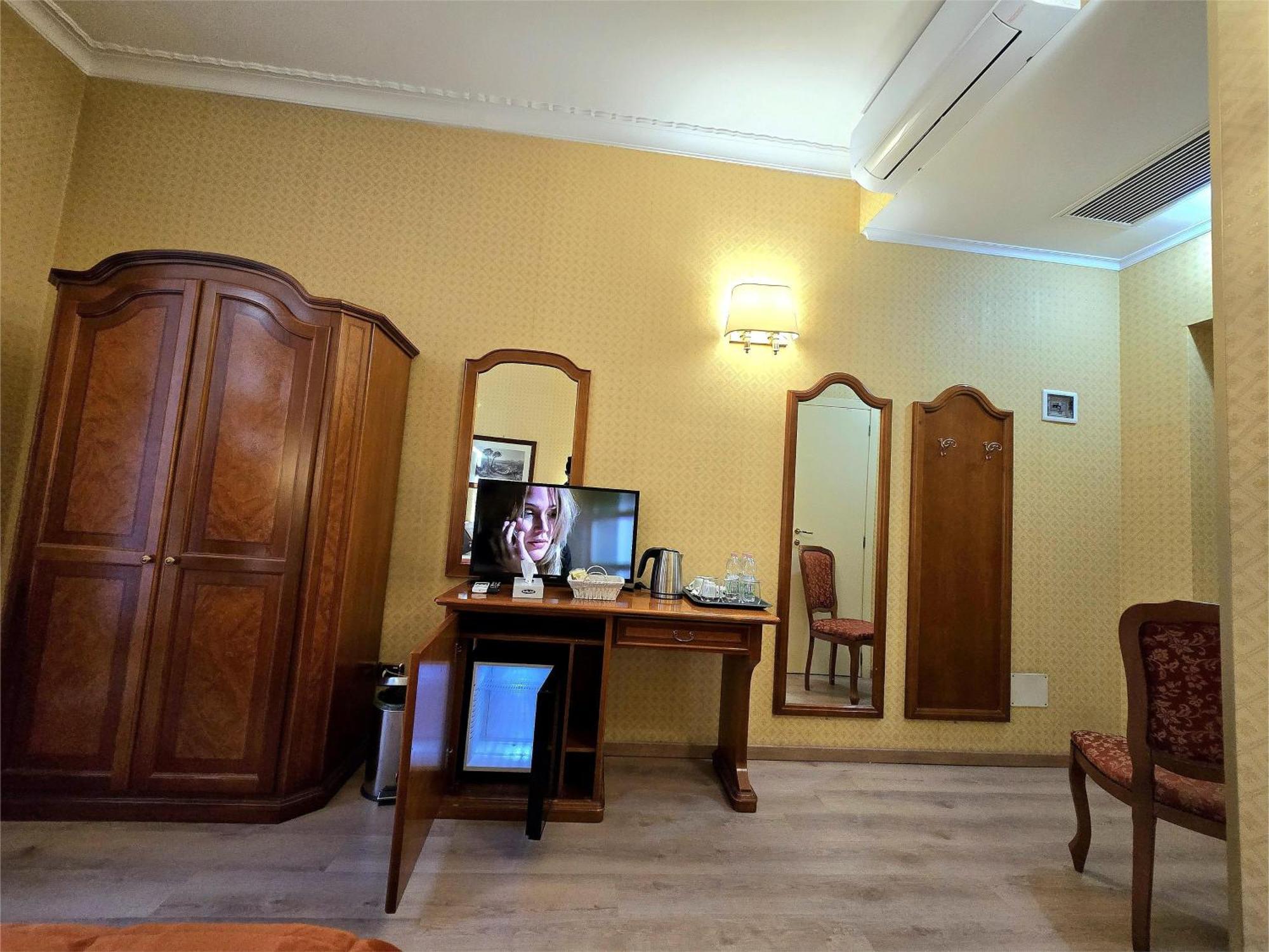 Quarto Triplo com Vista da Cidade
