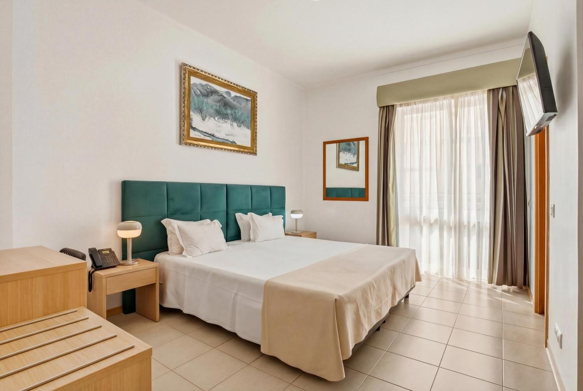Double or Twin Room with Side Sea View