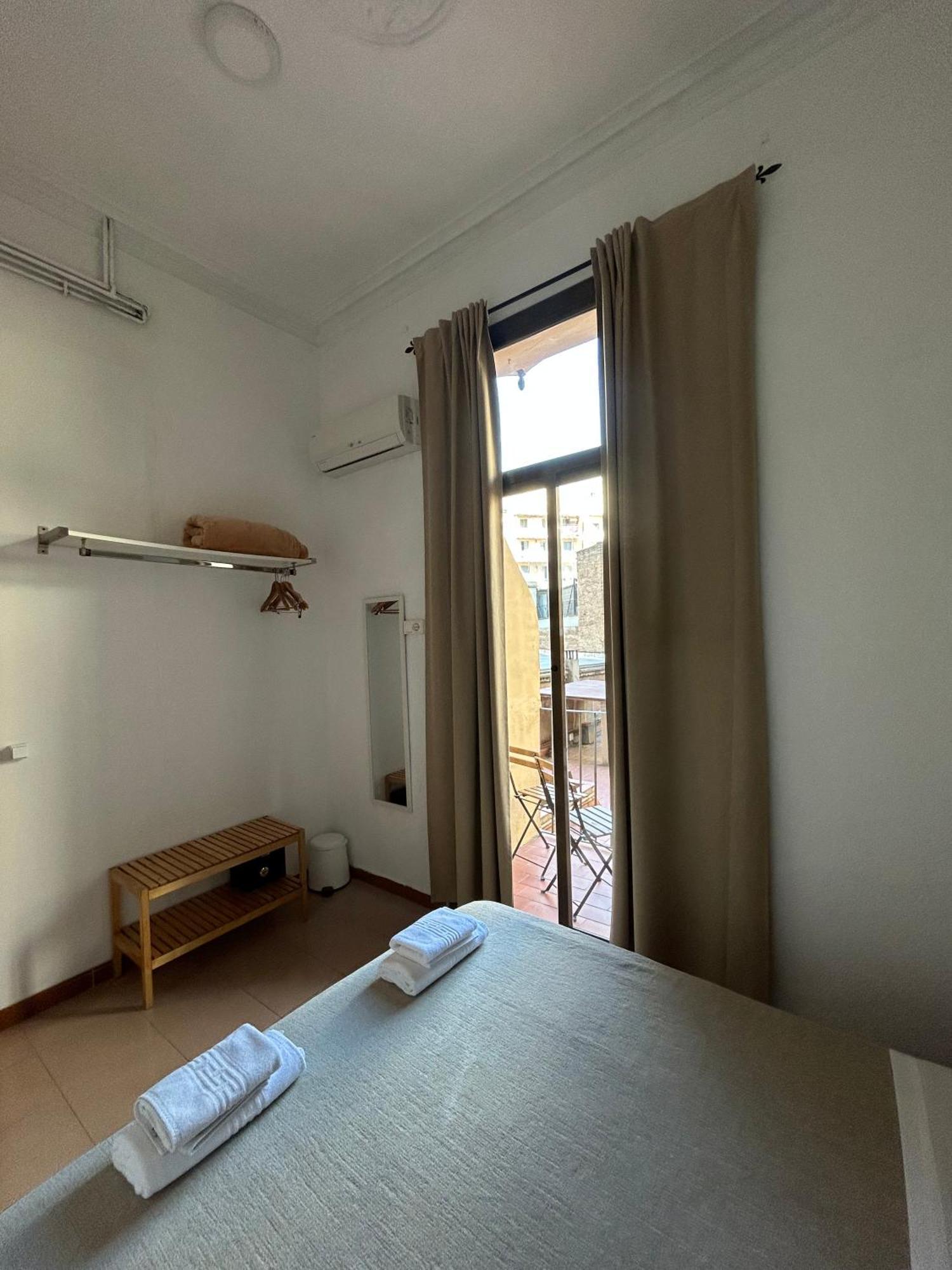 Tweepersoonskamer met 1 of 2 Bedden en Gedeelde Badkamer