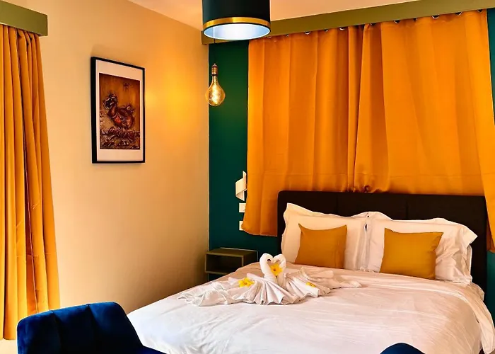 Les Palmiers Sainte-Rose Restaurant Et Chambres