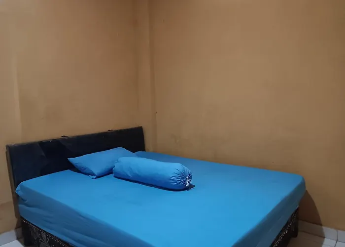 Oyo 93073 Penginapan 69