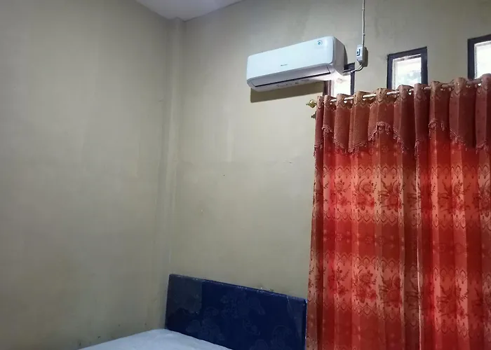 Oyo 93073 Penginapan 69