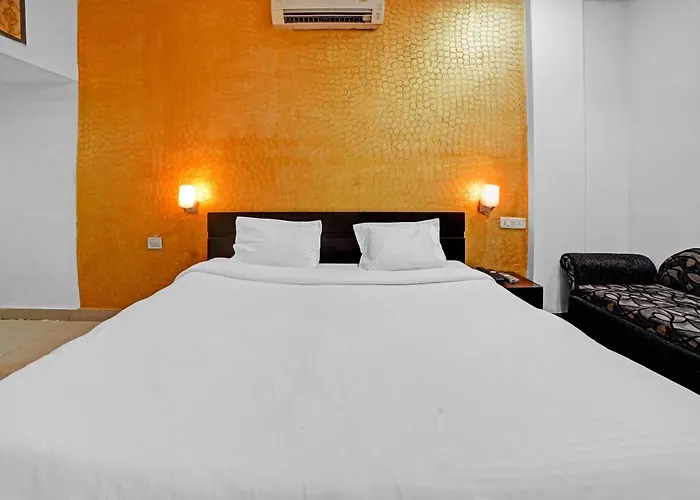 Capital O Convivial Hotel Amit Regency